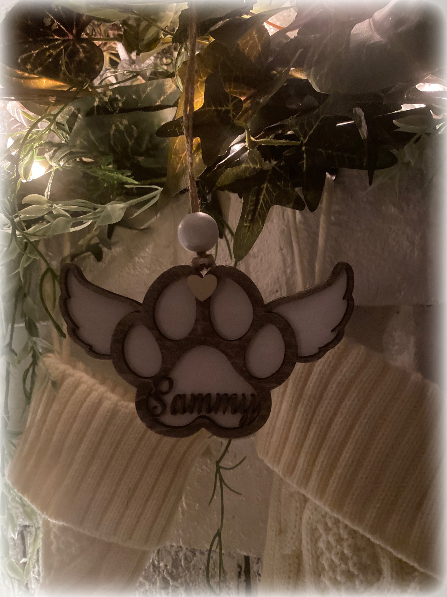 Paw print ornament with or without wings