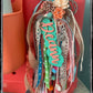 Over the top customer charm tassel